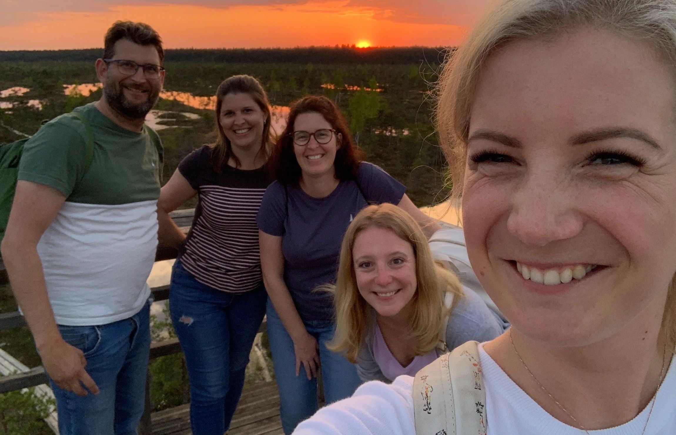 Group at sunset overlook Latvia